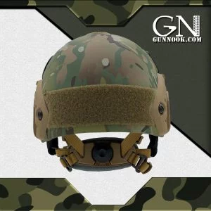 Military tactical helmet featuring a camouflage pattern and adjustable straps.