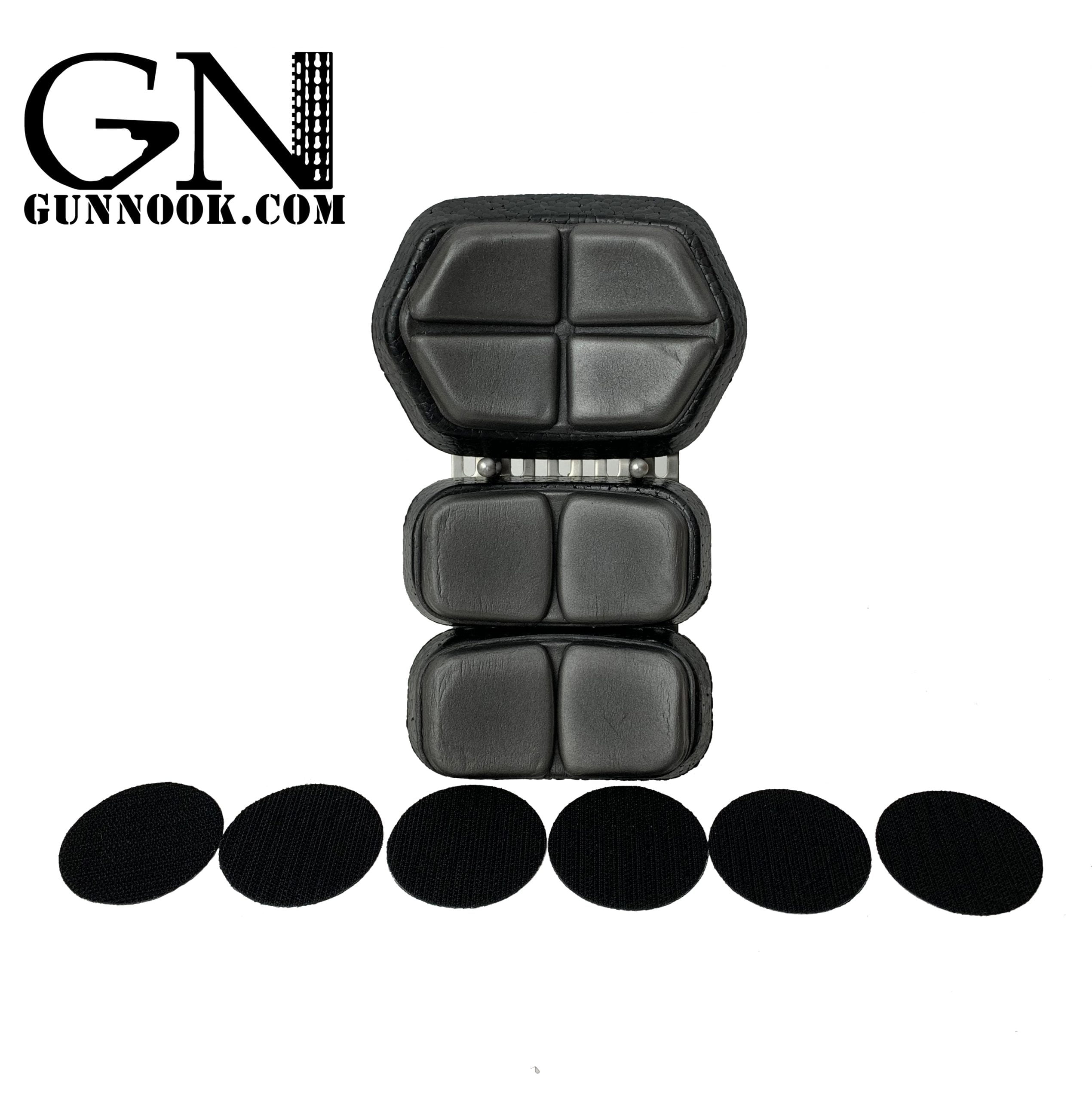 Black protective padding with a segmented design and six round Velcro strips.