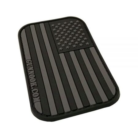 Black rubber patch featuring a stylized American flag with raised stars and stripes.